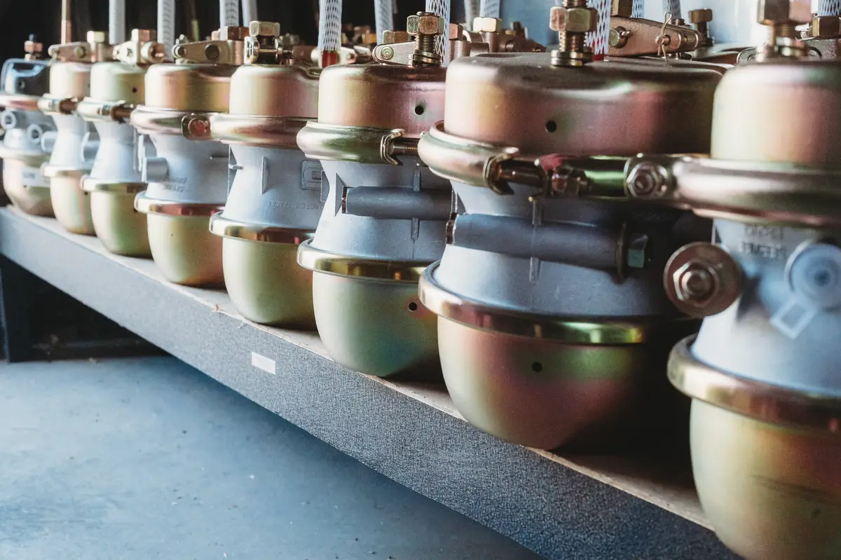 Brake chambers on a parts shelf
