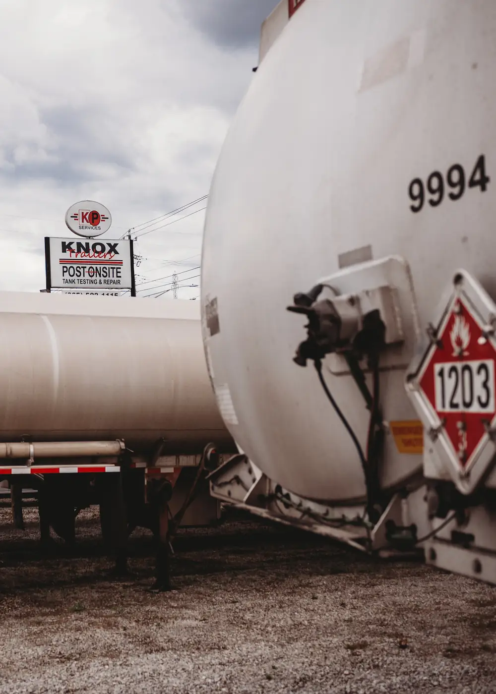 Tanker trailers on the lot, Knox Trailers and Post Onsite sign behind